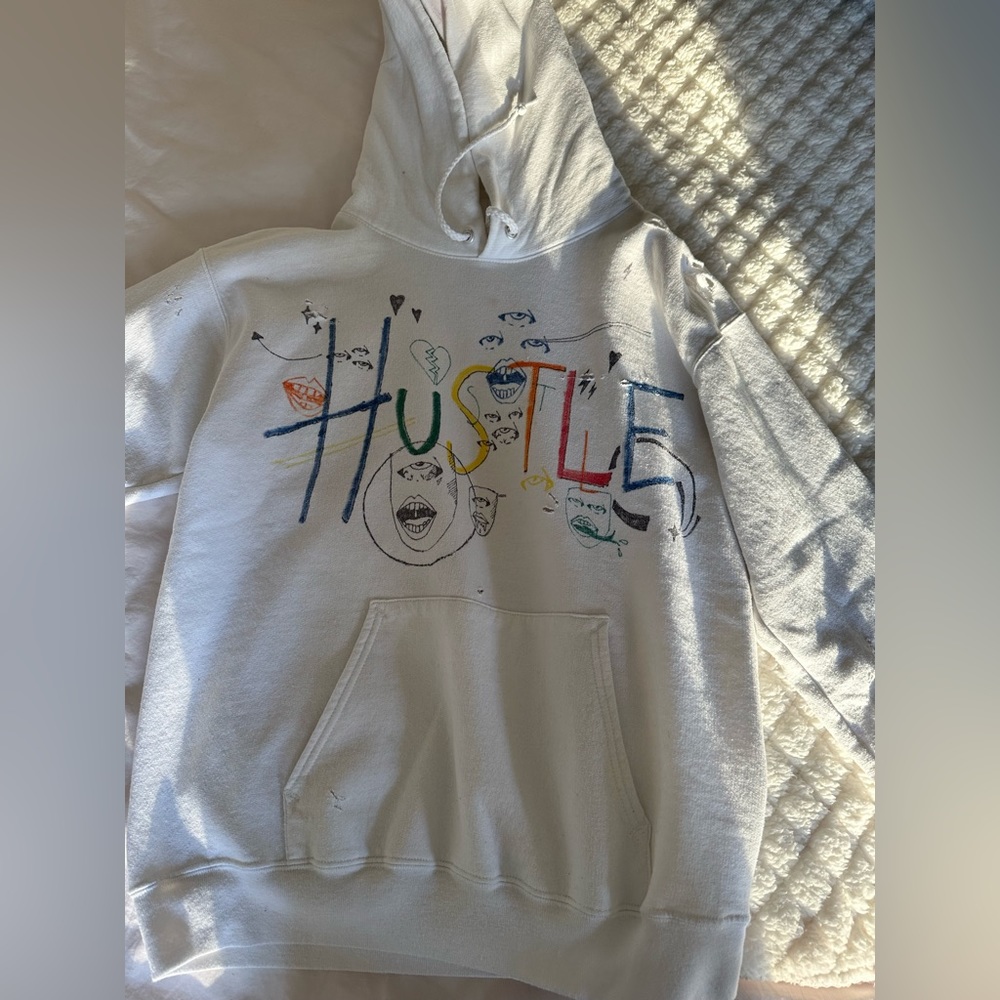 White hoodie with designs. Size s.